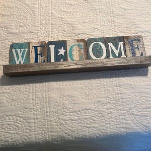 Wooden welcome sign